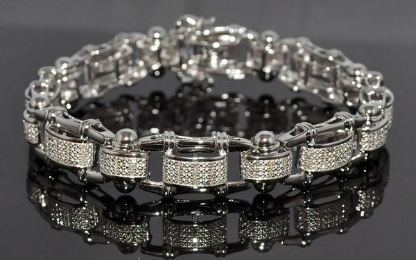 Take a look at this fantastic white gold bracelet with diamonds, we can make it for you to order.