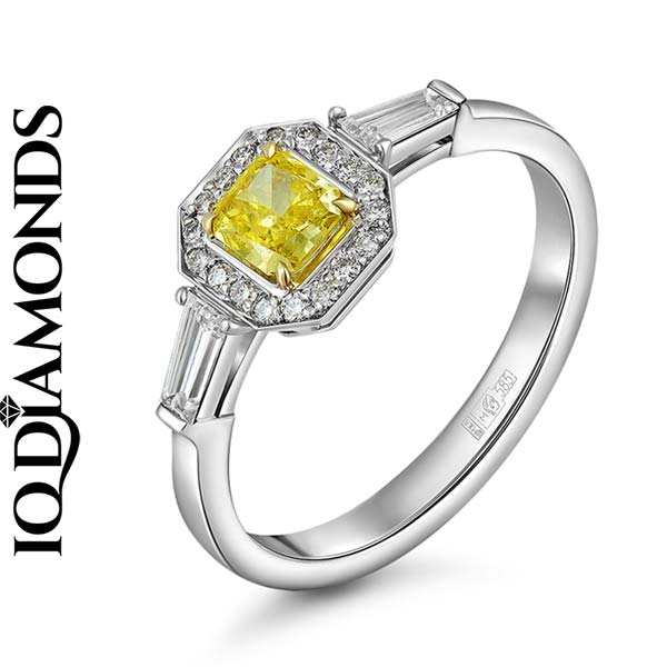 Engagement ring with a laboratory-grown yellow diamond of 0.320 carats with double side accents of a baguette, 103,272 rubles.